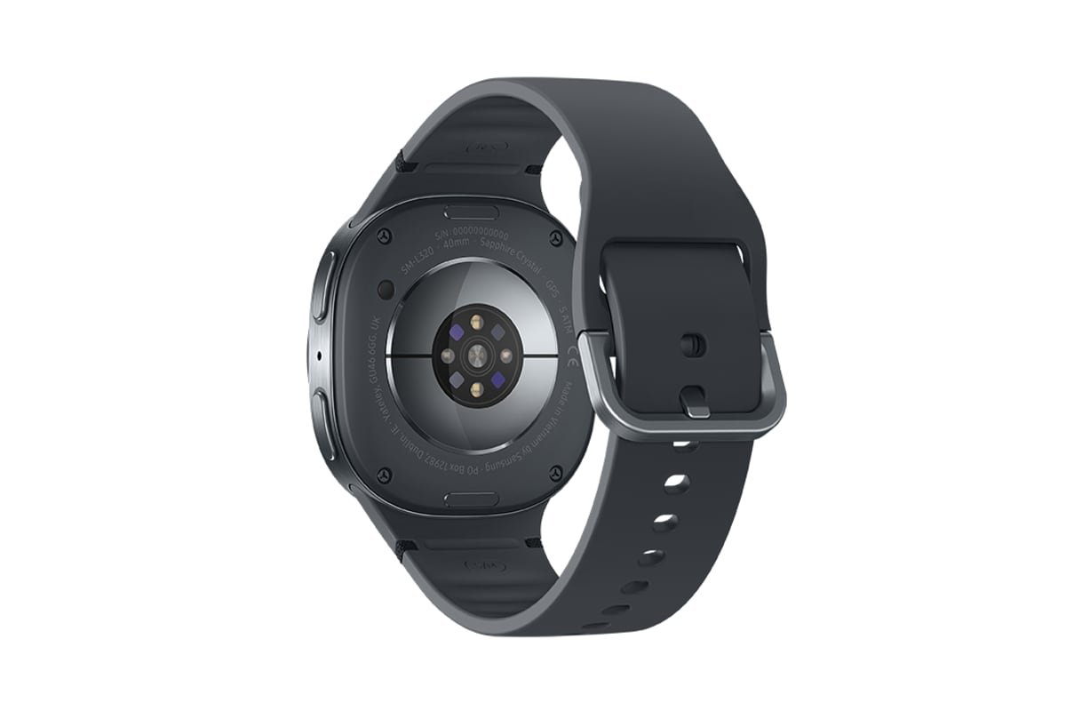 The back of the Samsung Bark Watch at an angle, showing the round sensor array in the centre of the case and the strap fastened around it.